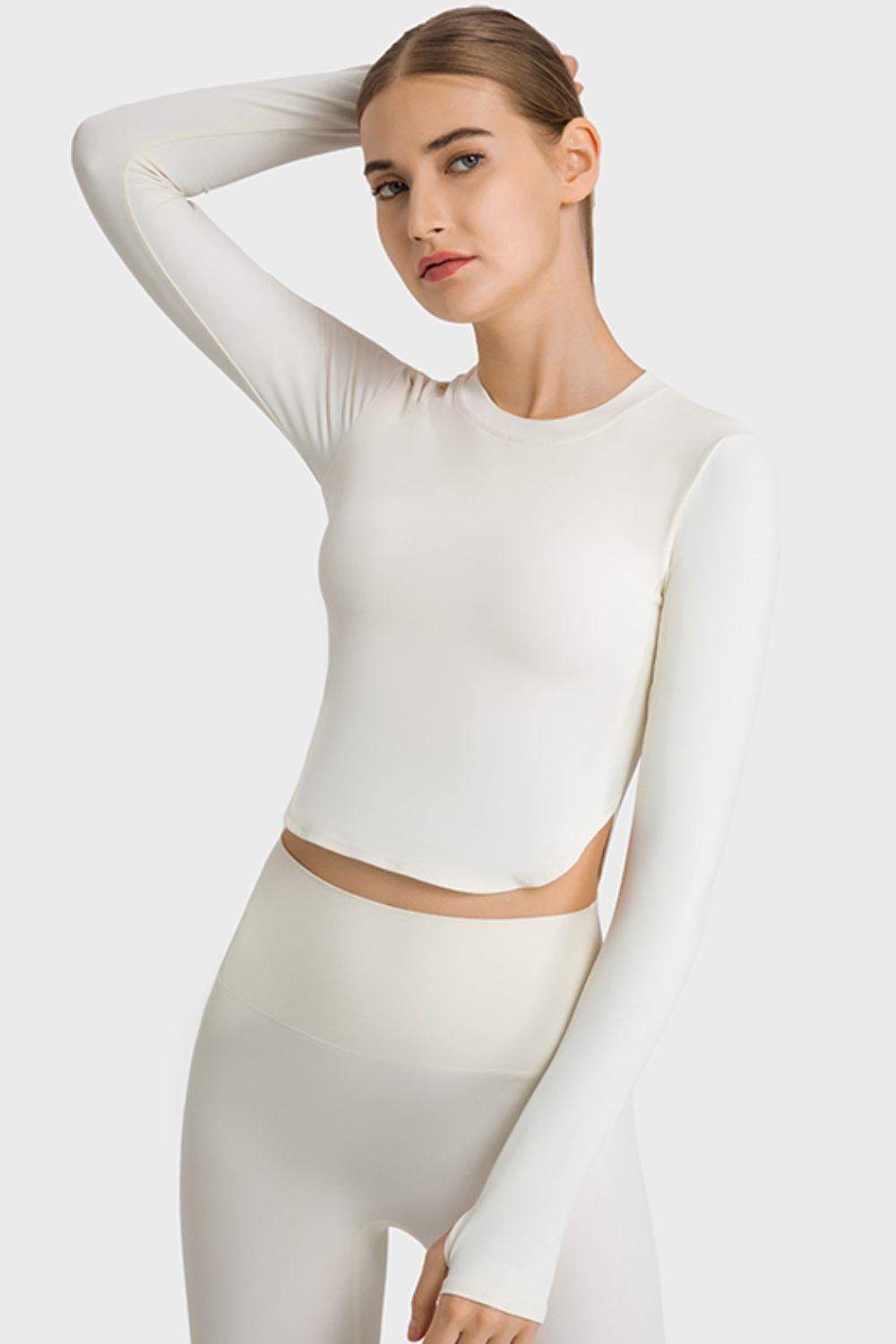 Millennia Side Slit Long Sleeve Round Neck Crop Top